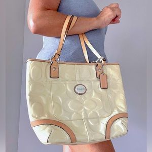 Coach Ivory Cream Signature C Patent Leather Handbag.
